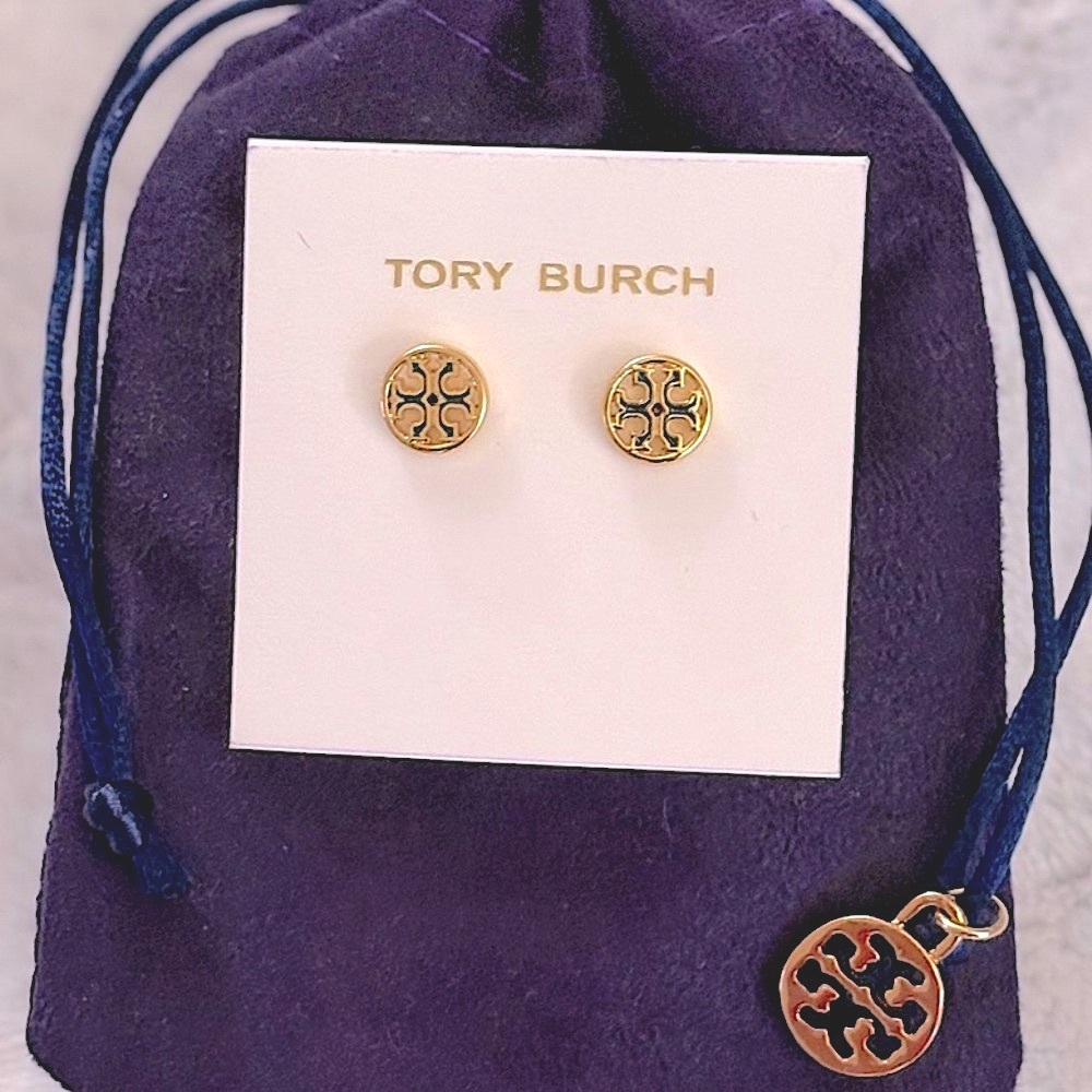 TORY BURCH:Gold stud earrings w/black outline.
Never Worn! Storage bag included.